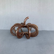 Load image into Gallery viewer, Small (pony) pumpkin with rusted patina
